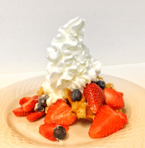 Waffle Toppings Ideas A Waffle Topped with Whipped Cream and Fruit